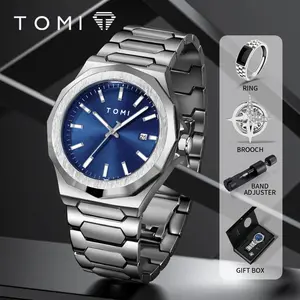 ⌚ طقم ساعة تومي الفاخرة لرجال الأعمال ⌚ ساعة كوارتز أنيقة بإطار ذهبي وردي فاخر وتصميم بسيط ومتعدد الاستخدامات يناسب مختلف الإطلالات. تأتي في صندوق هدايا عالي الجودة، مما يجعلها خيارًا مثاليًا كهدية فاخرة للأصدقاء أو المناسبات الخاصة. تصميم يجمع بين الفخامة والعملية ليرافقك في العمل والمناسبات الرسمية.